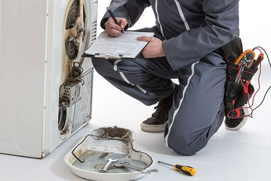 QuickFix Appliances technician repairing a home appliance